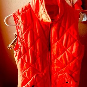 Orange small puffer vest very nice barely worn
